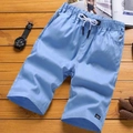 Atmungsaktive hellblaue Herren-Baumwollshorts mit elastischem Kordelzug und Seitentaschen - M / Blau