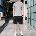 Completo sportivo estivo da uomo con t-shirt grigia e pantaloncini neri sportivi - M / Grigio