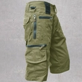 Detail view of military green cargo shorts featuring tactical multi-pocket design and D-ring - Light Green