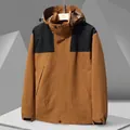 Veste à capuche outdoor pour hommes et femmes en style color-block caramel et noir - XS / Couleur caramel