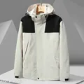 Veste outdoor imperméable blanc ivoire et noir avec capuche réglable pour le printemps - XS / Vert olive