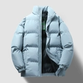 Light blue men's puffer jacket with stand collar and quilted pattern in a relaxed fit - M / Blue