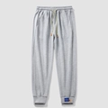 Pantaloni sportivi grigi da uomo con coulisse intrecciata e polsini a coste - M / Grigio