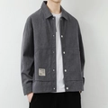 Men's charcoal grey corduroy varsity jacket featuring silver buttons and pocket label - M / Gray