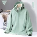 Women's outdoor hooded jacket in bean green with EXPLORE lettering and zipper pockets - M / Bean Green [Women]