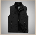 Detail of black outdoor vest showing breathable mesh lining and secure zipper pocket - Black