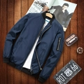 Classic navy blue men's bomber jacket with ribbed cuffs on a vintage wooden background - 6XL / Dark Blue