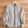 Chaqueta de hombre gris claro con cuello alto, cremallera naranja y puños con FREEDOM - 3XL / Gris