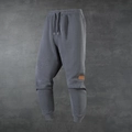 Pantaloni sportivi da uomo grigio scuro foderati in pile con coulisse in vita e dettaglio - XS / grigio scuro
