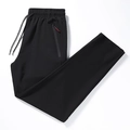Pantaloni da uomo neri in seta di ghiaccio con coulisse elastica e tasca laterale con zip - M / Nero