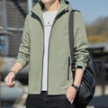 Olive green hooded windbreaker jacket with sleeve logo for men in casual outdoor setting - M / Light Green