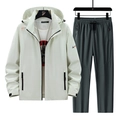 Men's two-piece sports set featuring a beige hooded jacket and dark grey joggers - M / Off White