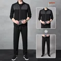Men's 2-piece athletic set featuring a black zip-up jacket and matching casual jogger pants - M / 908 Patchwork Jacket and Pants Set