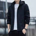 Men's black hooded windbreaker jacket with orange text prints and zipper pockets - M / Black