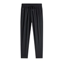 Pantaloni joggers neri da uomo in seta ghiacciata con coulisse elastica e tasche con zip - M / Stile a gamba con polsino / Nero