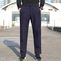 Pantalón deportivo elástico azul marino para hombre con bolsillos de cremallera y corte slim - L / Azul oscuro