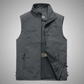 Detail showing the breathable mesh lining and zippered pockets of the charcoal outdoor vest - M / Gray