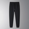 Men's black ice silk jogger pants with elastic drawstring waist and zippered pockets - M / Black Joggers
