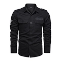 Detailed view of black military cargo shirt with buttoned pockets and shoulder epaulets - M / Black