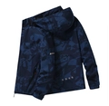 Detailed view of waterproof camouflage outdoor jacket with hood and brand logo on chest - M / Navy Blue