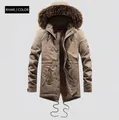 Detailed macro of khaki winter parka with thick fur hood and warm fleece lining - L / Khaki