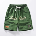 Pantaloncini sportivi uomo in seta di ghiaccio verde scuro con stampa NASA e coulisse in vita - M / Verde Militare