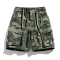 Men's loose fit cargo shorts featuring jungle camouflage print and large utility pockets - EU 28 / Army Green