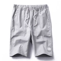 Men's light grey drawstring cargo shorts with elastic waist and large utility pockets - M / Gray