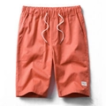 Men's drawstring cotton cargo shorts in vibrant coral orange with elastic waist and pockets - M / Orange