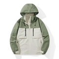 Wasserdichte Outdoor-Kapuzenjacke in bohnenrünem und cremeweißem Patchwork-Design - XS / Elfenbein