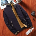 Men's winter fleece jacket with high collar and warm yellow lining on wooden floor - M / Dark Blue
