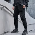 Men's black multi-pocket techwear cargo pants with tactical D-ring detailing - M / Black