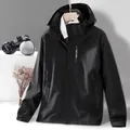 Women's black hooded windbreaker jacket with zip pockets and protective stand collar - Women's Black
