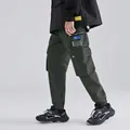Men's dark green cargo pants featuring techwear multi-pockets and functional aesthetic - M / Green