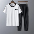 Zomers sportset voor heren met wit t-shirt en zwarte broek van sneldrogende functionele stof - M / Wit Top + Zwarte Broek
