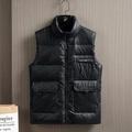 Men's glossy black down vest with stand collar and large pockets on wood background - M / Black