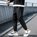 Pantalón informal negro para hombre con puños elásticos y bolsillos laterales con cremallera - M / Negro