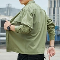 Camisa cargo de hombre verde militar en algodón, corte holgado con bolsillo frontal - M / Verde