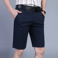 Men's navy blue casual cotton cargo shorts in straight fit with black leather belt detail - EU 30 / Royal Blue