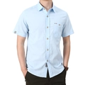 Camicia da uomo a maniche corte azzurra in cotone con taschino sul petto e stile casual - S / Celeste
