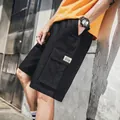 Pantaloncini cargo neri da uomo con tasche laterali e coulisse in cotone pesante - M / 1315 Nero