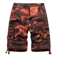 Men's cargo shorts featuring red camo print with multi-pockets and drawstring cuffs - EU 30 / Red Camouflage
