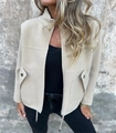 Detail of waffle textured wool-like fabric on beige zipper jacket with drawstrings - Apricot