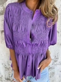 Detailed view of the purple smocked texture and button closure on this summer casual shirt - S / Purple