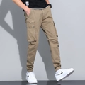 Men's khaki cotton cargo pants featuring tactical side pockets and elastic ribbed cuffs - EU 29 / Khaki