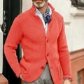 Detail of orange men's chunky waffle knit cardigan featuring high collar and button placket - S / Tops / Orange Red