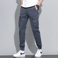 Men's dark grey cotton cargo joggers with side flap pockets and elastic cuffs - 657 Gray / 29