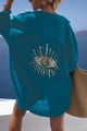 Detail of sequined evil eye embroidery on the back of a blue beach shirt cover-up - S / Navy Blue