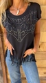 Detail view of black round-neck T-shirt featuring silver studs and long fringe hem tassels - S / Tops / Black