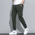 Men's casual cargo jogger pants in dark green featuring large side pockets and ribbed cuffs - 657 Military Green / 29